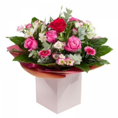 A Secret Admirer - Send this beautiful collection of romantic flowers, expertly arranged to say “I love you” in an unforgettable way.
