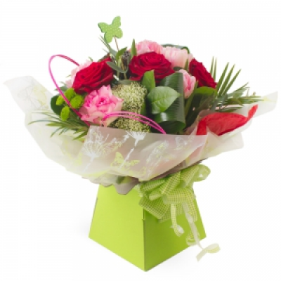 Butterflies & Roses - Red and pink roses and super foliage make this Hand Tied a special gift for any occasion.
