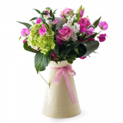 Home Sweet Home - A vibrant mix of flowers and foliage's arranged in a vase. Perfect for any occasion.(Container may Vary)
