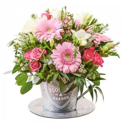 Paige - A timeless arrangement of pinks and creams in a lovely container.
