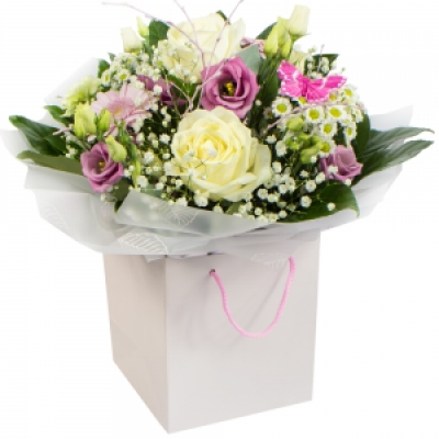 Zoe - A beautiful Hand Tied of soft shaded flowers.
