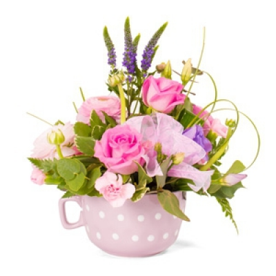 Time for Tea! - A petite arrangement of flowers in a pretty container.
