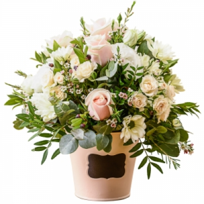 Dawn - An inspiration from nature. A flower gift perfectly arranged in a container using pale shaded flowers and foliage.
