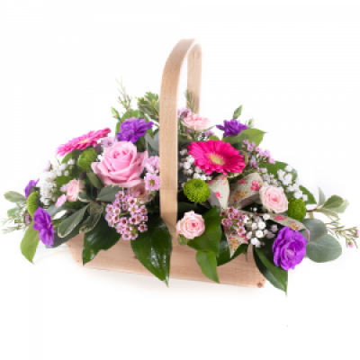 Bon Bon - Shower them with love with this cutesy collection of seasonal flowers in pretty pastels. Beautifully arranged and stylishly presented in a traditional basket. 
