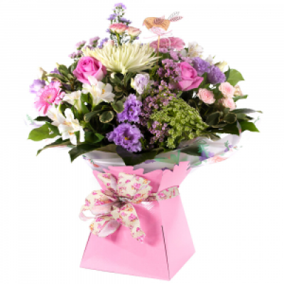 Sugar Rush - This gorgeous hand-tied bouquet of sweet pastel shades is sure to bring joy and delight. Crammed with beautiful flowers guaranteed to put a boost into any occasion.
