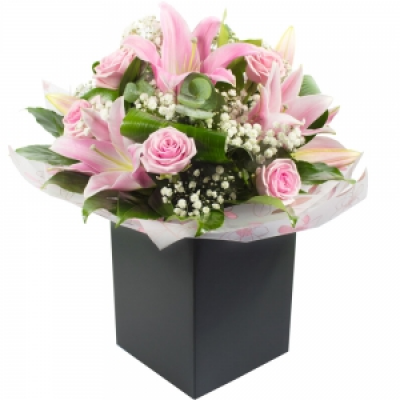 Sylvie - Want to send something extra special?Lilies and Roses are the perfect combination.
