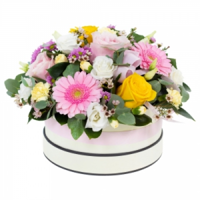 Dreamland - A beautiful hat box filled to the brim with a fabulous combination of selected pastel shaded flowers and foliage. 
